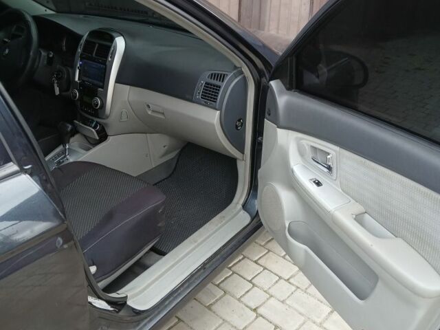 Черный Киа Черато, объемом двигателя 2 л и пробегом 250 тыс. км за 3700 $, фото 11 на Automoto.ua