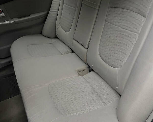 Черный Киа Черато, объемом двигателя 1.59 л и пробегом 273 тыс. км за 2999 $, фото 6 на Automoto.ua