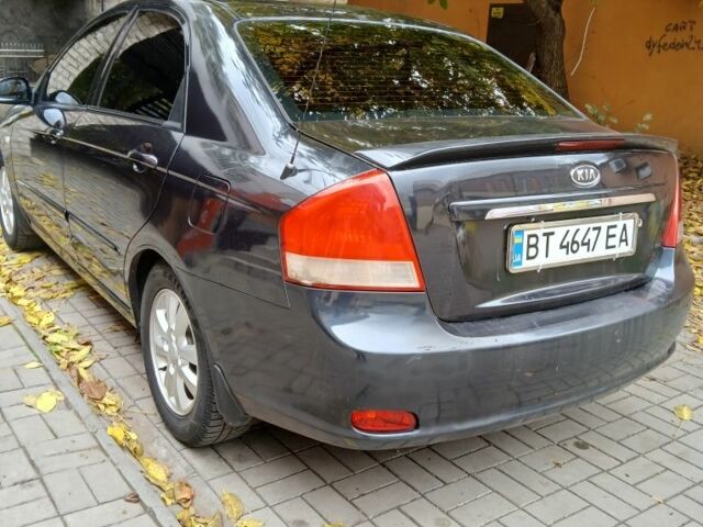 Черный Киа Черато, объемом двигателя 2 л и пробегом 250 тыс. км за 3700 $, фото 7 на Automoto.ua