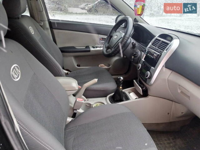 Черный Киа Черато, объемом двигателя 1.59 л и пробегом 235 тыс. км за 4000 $, фото 8 на Automoto.ua