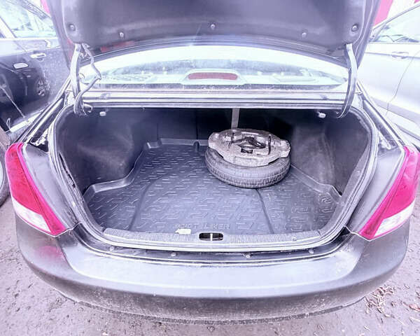 Чорний Кіа Черато, об'ємом двигуна 1.59 л та пробігом 250 тис. км за 4300 $, фото 22 на Automoto.ua