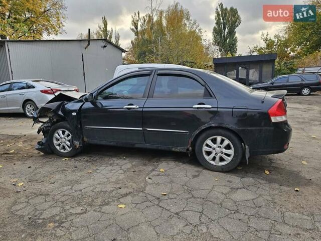 Чорний Кіа Черато, об'ємом двигуна 1.59 л та пробігом 200 тис. км за 1350 $, фото 2 на Automoto.ua