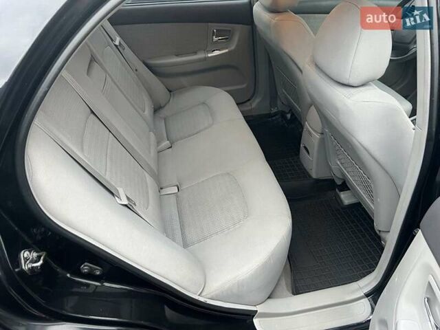 Черный Киа Черато, объемом двигателя 1.6 л и пробегом 180 тыс. км за 4900 $, фото 7 на Automoto.ua