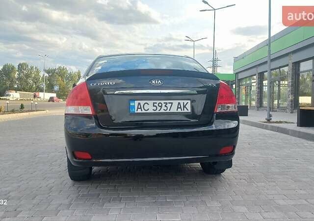 Черный Киа Черато, объемом двигателя 1.98 л и пробегом 268 тыс. км за 5200 $, фото 9 на Automoto.ua