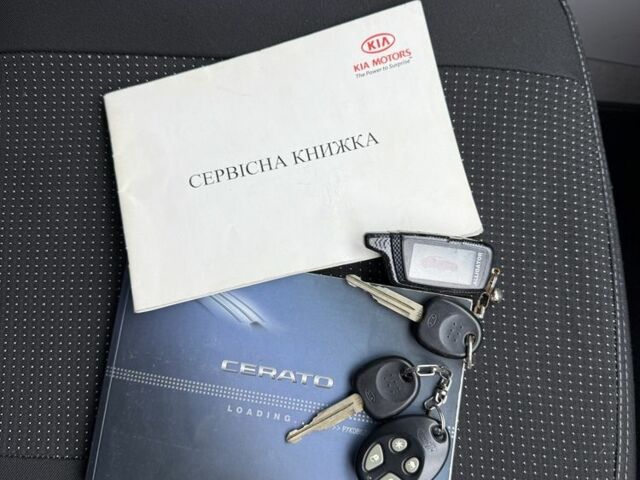 Чорний Кіа Черато, об'ємом двигуна 1.6 л та пробігом 320 тис. км за 3500 $, фото 22 на Automoto.ua