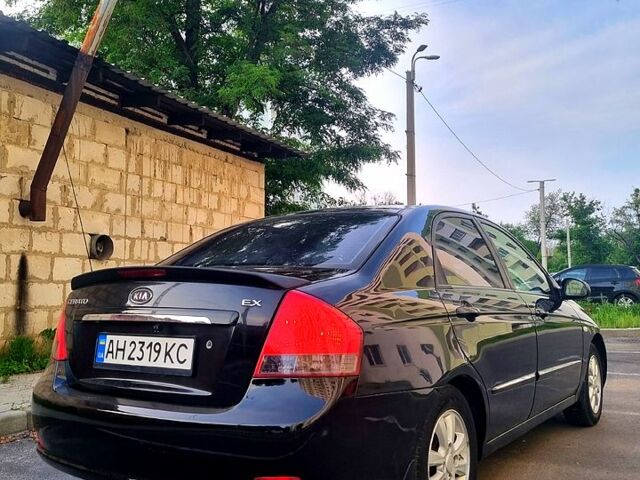 Черный Киа Черато, объемом двигателя 1.6 л и пробегом 200 тыс. км за 3999 $, фото 2 на Automoto.ua