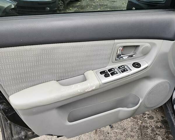 Киа Черато 2007 в Киеве на Automoto.ua Черный Киа Черато, объемом двигателя 1.59 л и пробегом 200 тыс. км за 1150 $, фото 10 на Automoto.ua