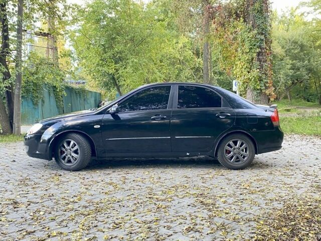 Черный Киа Черато, объемом двигателя 2 л и пробегом 302 тыс. км за 4600 $, фото 3 на Automoto.ua