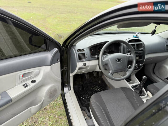 Черный Киа Черато, объемом двигателя 1.59 л и пробегом 312 тыс. км за 3000 $, фото 8 на Automoto.ua