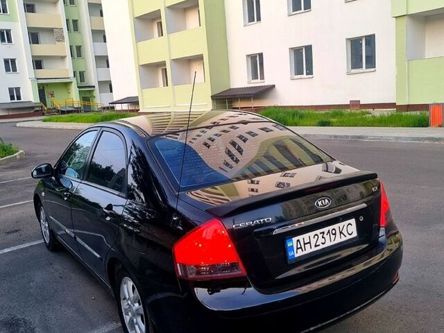 Черный Киа Черато, объемом двигателя 1.6 л и пробегом 200 тыс. км за 3999 $, фото 5 на Automoto.ua