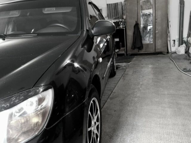 Черный Киа Черато, объемом двигателя 1 л и пробегом 193 тыс. км за 4600 $, фото 8 на Automoto.ua