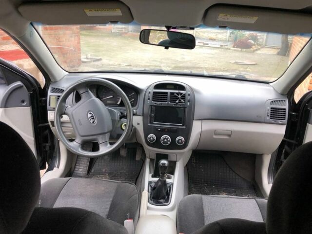 Черный Киа Черато, объемом двигателя 1.6 л и пробегом 240 тыс. км за 3300 $, фото 12 на Automoto.ua