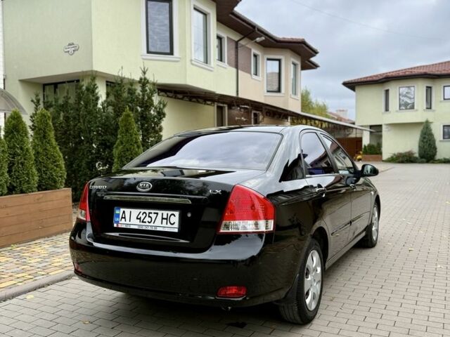 Чорний Кіа Черато, об'ємом двигуна 1.6 л та пробігом 320 тис. км за 3500 $, фото 4 на Automoto.ua