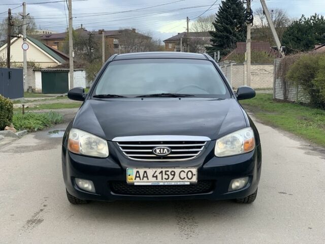 Черный Киа Черато, объемом двигателя 2 л и пробегом 220 тыс. км за 3950 $, фото 5 на Automoto.ua