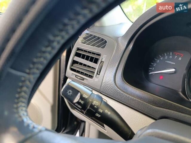Черный Киа Черато, объемом двигателя 1.59 л и пробегом 219 тыс. км за 4600 $, фото 32 на Automoto.ua