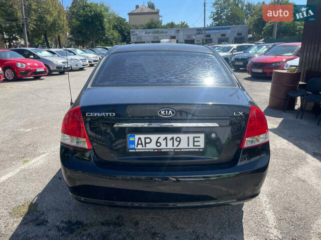 Черный Киа Черато, объемом двигателя 1.59 л и пробегом 210 тыс. км за 4100 $, фото 4 на Automoto.ua