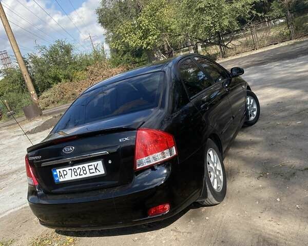 Чорний Кіа Черато, об'ємом двигуна 1.6 л та пробігом 157 тис. км за 5800 $, фото 5 на Automoto.ua