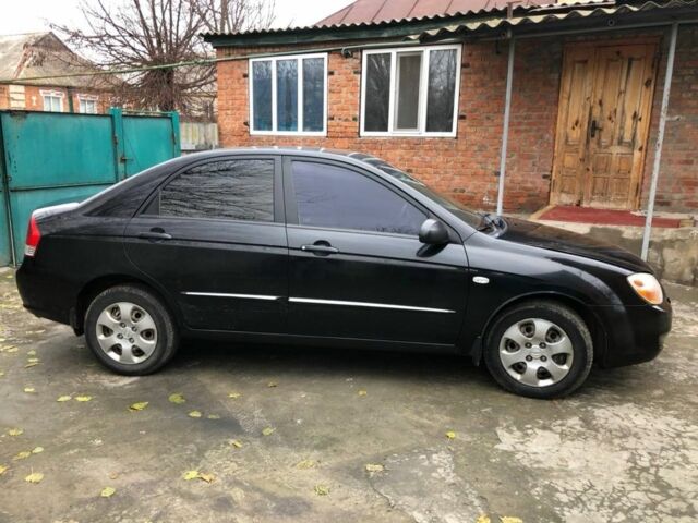 Черный Киа Черато, объемом двигателя 1.6 л и пробегом 240 тыс. км за 3300 $, фото 7 на Automoto.ua