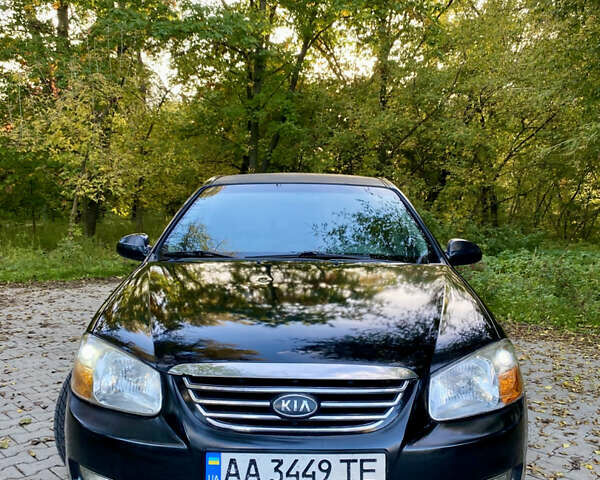 Чорний Кіа Черато, об'ємом двигуна 1.98 л та пробігом 302 тис. км за 4700 $, фото 1 на Automoto.ua