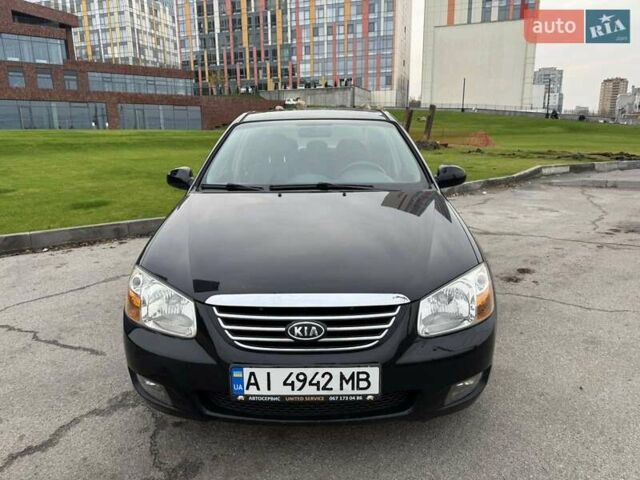 Черный Киа Черато, объемом двигателя 1.6 л и пробегом 232 тыс. км за 3850 $, фото 3 на Automoto.ua