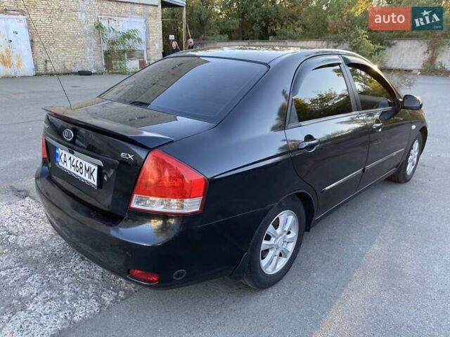 Черный Киа Черато, объемом двигателя 1.98 л и пробегом 335 тыс. км за 4100 $, фото 5 на Automoto.ua