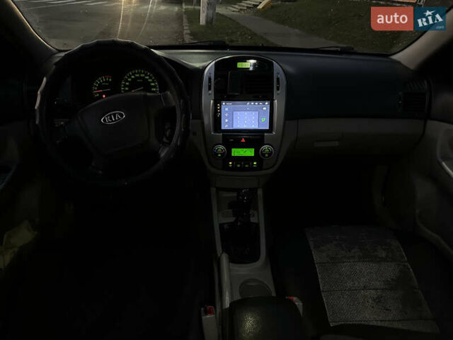 Черный Киа Черато, объемом двигателя 1.6 л и пробегом 294 тыс. км за 3500 $, фото 8 на Automoto.ua