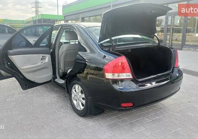 Черный Киа Черато, объемом двигателя 1.98 л и пробегом 268 тыс. км за 5200 $, фото 22 на Automoto.ua