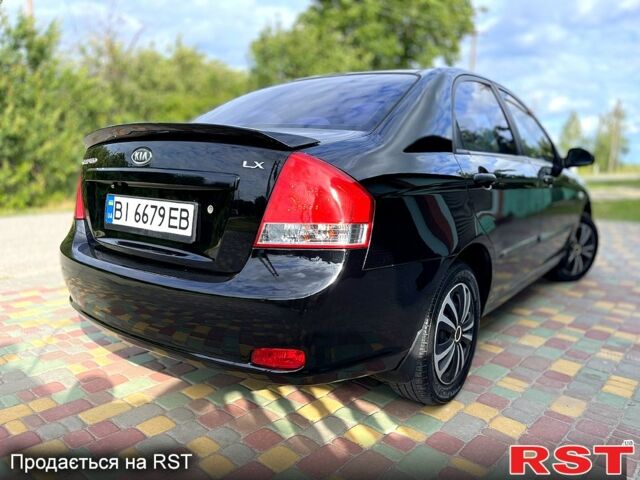 Черный Киа Черато, объемом двигателя 1.6 л и пробегом 190 тыс. км за 4350 $, фото 2 на Automoto.ua