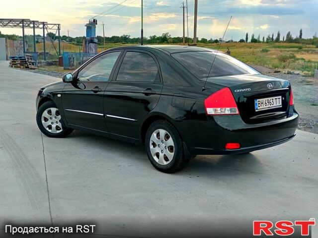 Черный Киа Черато, объемом двигателя 1.6 л и пробегом 210 тыс. км за 4000 $, фото 5 на Automoto.ua