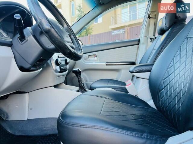 Киа Черато 2007 в Черновцах на Automoto.ua Черный Киа Черато, объемом двигателя 1.6 л и пробегом 210 тыс. км за 3950 $, фото 27 на Automoto.ua