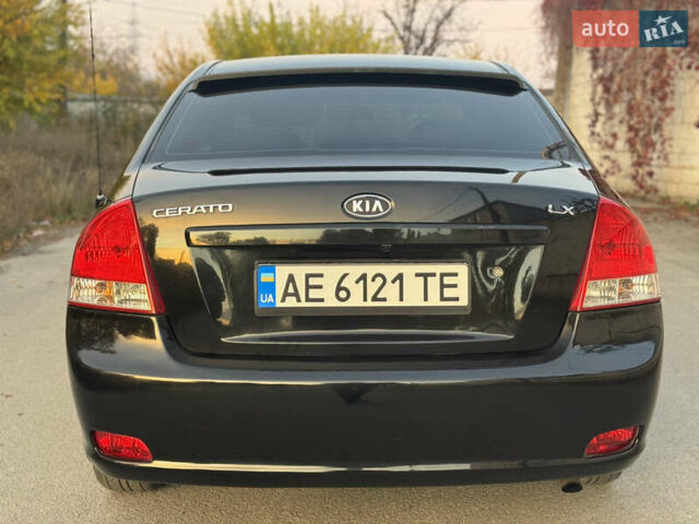 Черный Киа Черато, объемом двигателя 1.6 л и пробегом 235 тыс. км за 4900 $, фото 4 на Automoto.ua