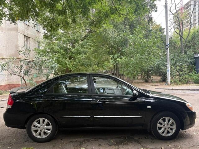 Черный Киа Черато, объемом двигателя 2 л и пробегом 250 тыс. км за 5000 $, фото 2 на Automoto.ua