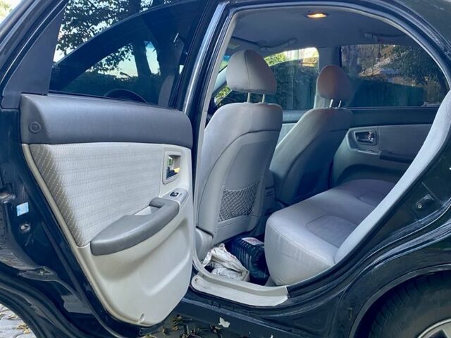 Черный Киа Черато, объемом двигателя 2 л и пробегом 302 тыс. км за 4600 $, фото 6 на Automoto.ua