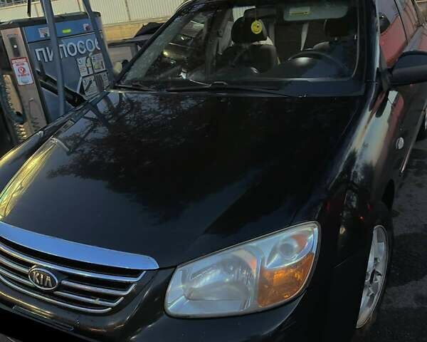 Черный Киа Черато, объемом двигателя 1.59 л и пробегом 273 тыс. км за 4200 $, фото 6 на Automoto.ua