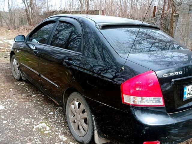 Чорний Кіа Черато, об'ємом двигуна 1.6 л та пробігом 215 тис. км за 3900 $, фото 4 на Automoto.ua