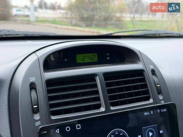 Чорний Кіа Черато, об'ємом двигуна 1.6 л та пробігом 224 тис. км за 4900 $, фото 45 на Automoto.ua
