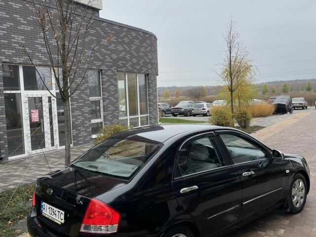 Черный Киа Черато, объемом двигателя 1.6 л и пробегом 256 тыс. км за 4200 $, фото 5 на Automoto.ua