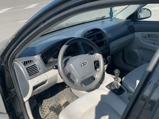 Черный Киа Черато, объемом двигателя 1.6 л и пробегом 172 тыс. км за 3400 $, фото 5 на Automoto.ua