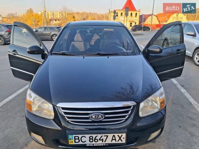 Черный Киа Черато, объемом двигателя 1.6 л и пробегом 246 тыс. км за 4850 $, фото 2 на Automoto.ua