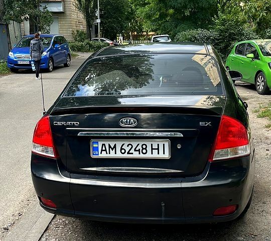 Черный Киа Черато, объемом двигателя 2 л и пробегом 163 тыс. км за 3000 $, фото 2 на Automoto.ua