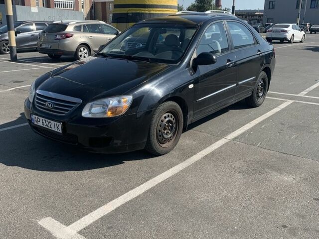 Черный Киа Черато, объемом двигателя 1.6 л и пробегом 172 тыс. км за 3400 $, фото 1 на Automoto.ua