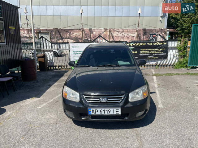 Черный Киа Черато, объемом двигателя 1.59 л и пробегом 210 тыс. км за 4100 $, фото 1 на Automoto.ua
