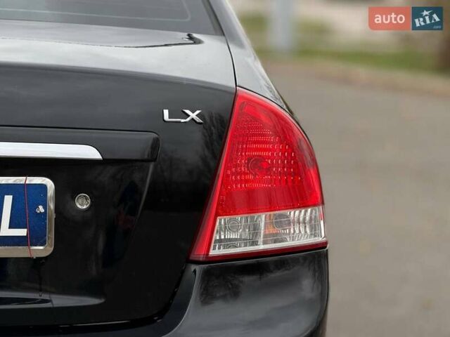 Чорний Кіа Черато, об'ємом двигуна 1.6 л та пробігом 224 тис. км за 4900 $, фото 21 на Automoto.ua