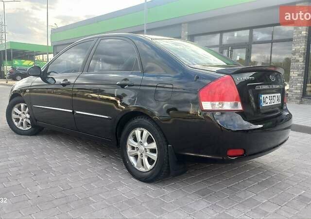 Черный Киа Черато, объемом двигателя 1.98 л и пробегом 268 тыс. км за 5200 $, фото 10 на Automoto.ua