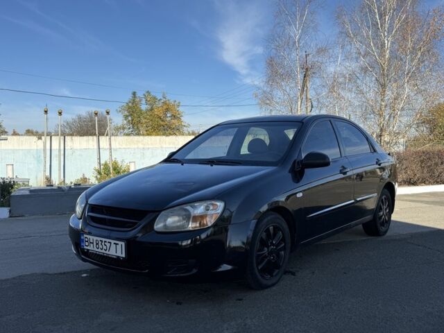 Чорний Кіа Черато, об'ємом двигуна 2 л та пробігом 362 тис. км за 3900 $, фото 1 на Automoto.ua