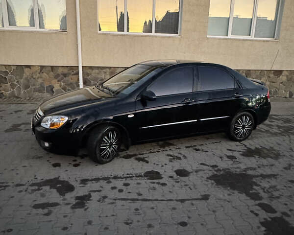 Чорний Кіа Черато, об'ємом двигуна 1.6 л та пробігом 197 тис. км за 5500 $, фото 6 на Automoto.ua