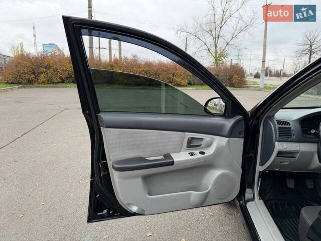 Чорний Кіа Черато, об'ємом двигуна 1.6 л та пробігом 224 тис. км за 4900 $, фото 33 на Automoto.ua