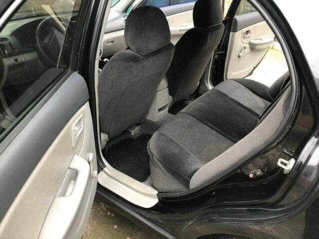 Черный Киа Черато, объемом двигателя 1.6 л и пробегом 240 тыс. км за 3300 $, фото 9 на Automoto.ua