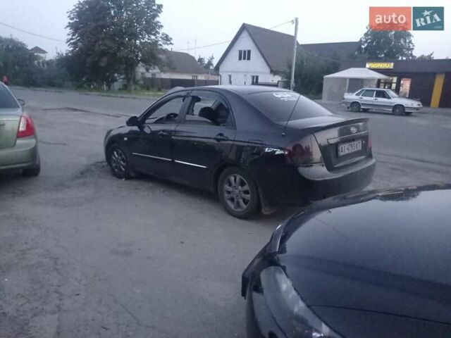 Черный Киа Черато, объемом двигателя 2 л и пробегом 340 тыс. км за 5500 $, фото 6 на Automoto.ua