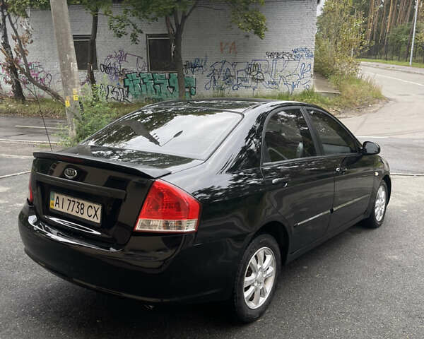 Черный Киа Черато, объемом двигателя 1.6 л и пробегом 211 тыс. км за 3200 $, фото 3 на Automoto.ua